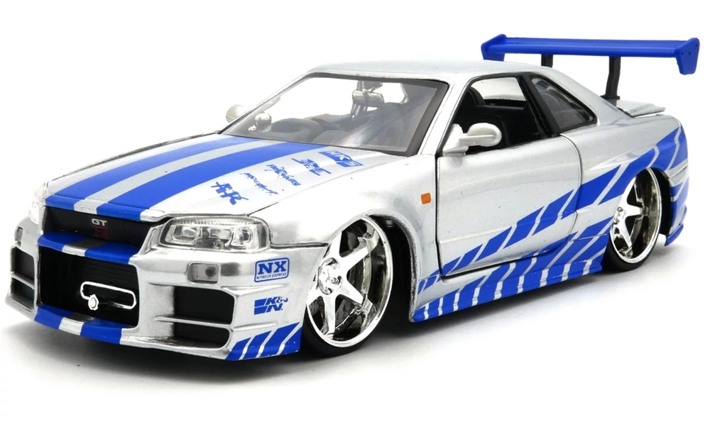 https://storage.alifshop.tj/media/images/alifshop/28285/igrushechnaya-modelka-nissan-gtr-1900-410-metallicheskaya-1-24-serebristo-siniy-1734689515541.png