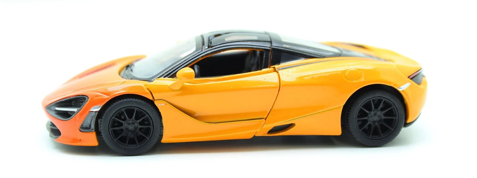 https://storage.alifshop.tj/media/images/alifshop/28318/igrushechnaya-modelka-mclaren-1900-210-metallicheskaya-1-24-oranzhevyy-1734948371053.png