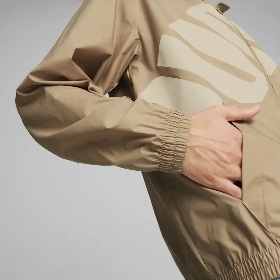 https://storage.alifshop.tj/media/images/alifshop/32461/vetrovka-puma-hooded-graphic-windbreaker-bezhevyy-1741760166229.png
