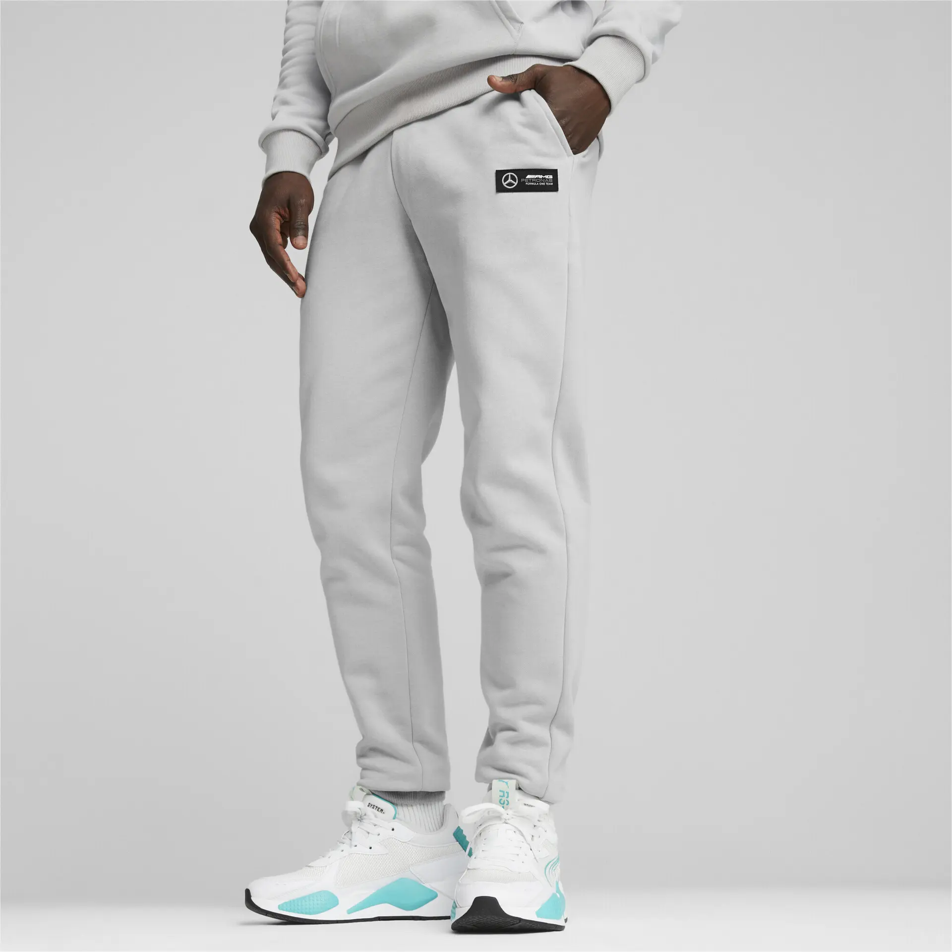 https://storage.alifshop.tj/media/images/alifshop/32744/muzhskie-sportivnye-shtany-puma-mapf1-ess-fleece-pants-xl-seryy-1741850419057.png