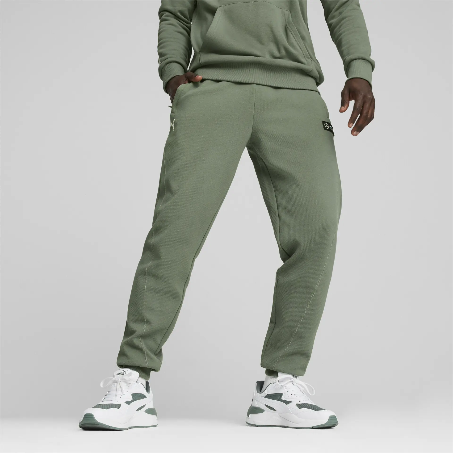 https://storage.alifshop.tj/media/images/alifshop/32836/muzhskie-sportivnye-shtany-puma-mapf1-sweatpants-reg-cc-m-zelenyy-1741927656928.png