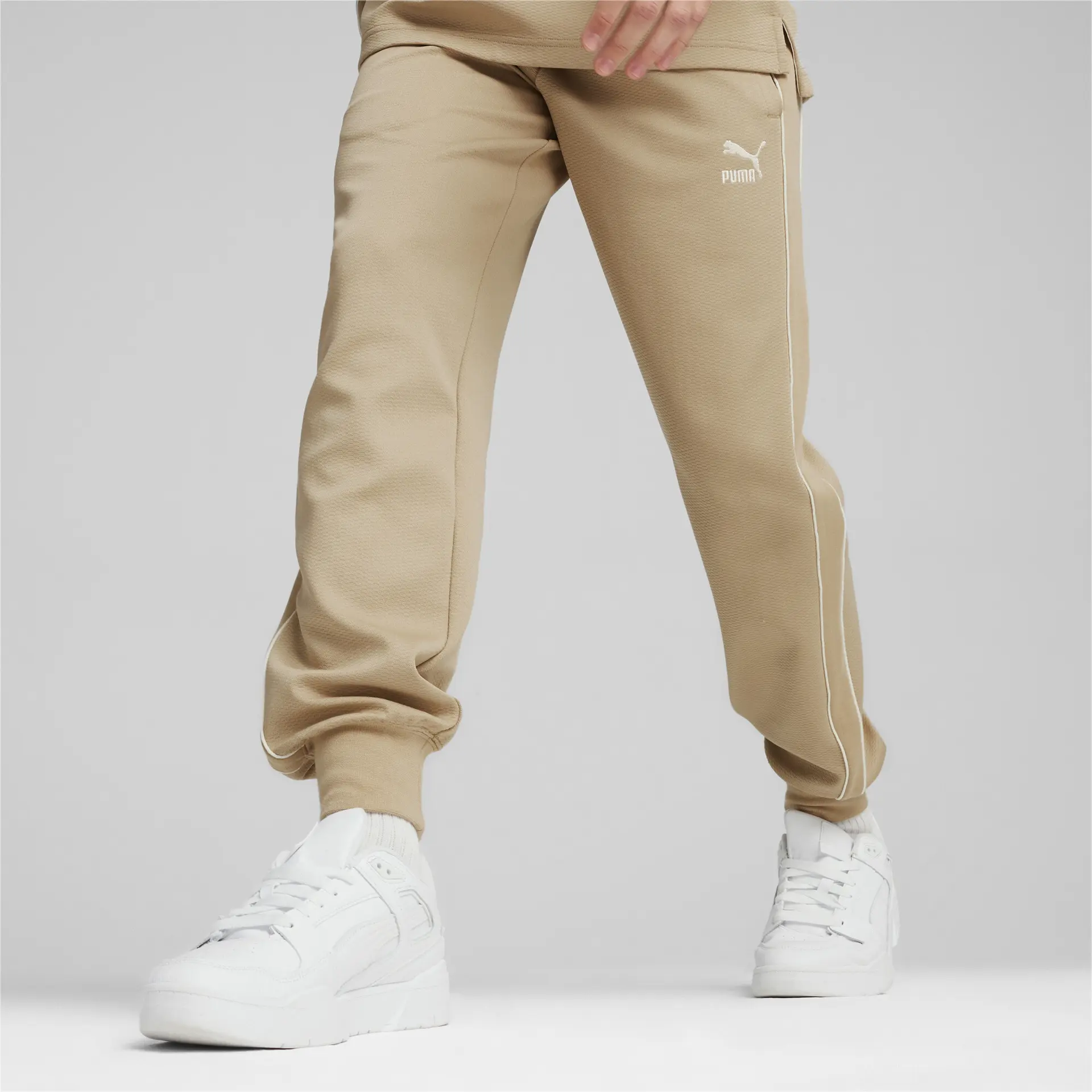 https://storage.alifshop.tj/media/images/alifshop/33392/muzhskie-sportivnye-shtany-puma-t7-track-pants-dk-m-bezhevyy-1742277539929.png