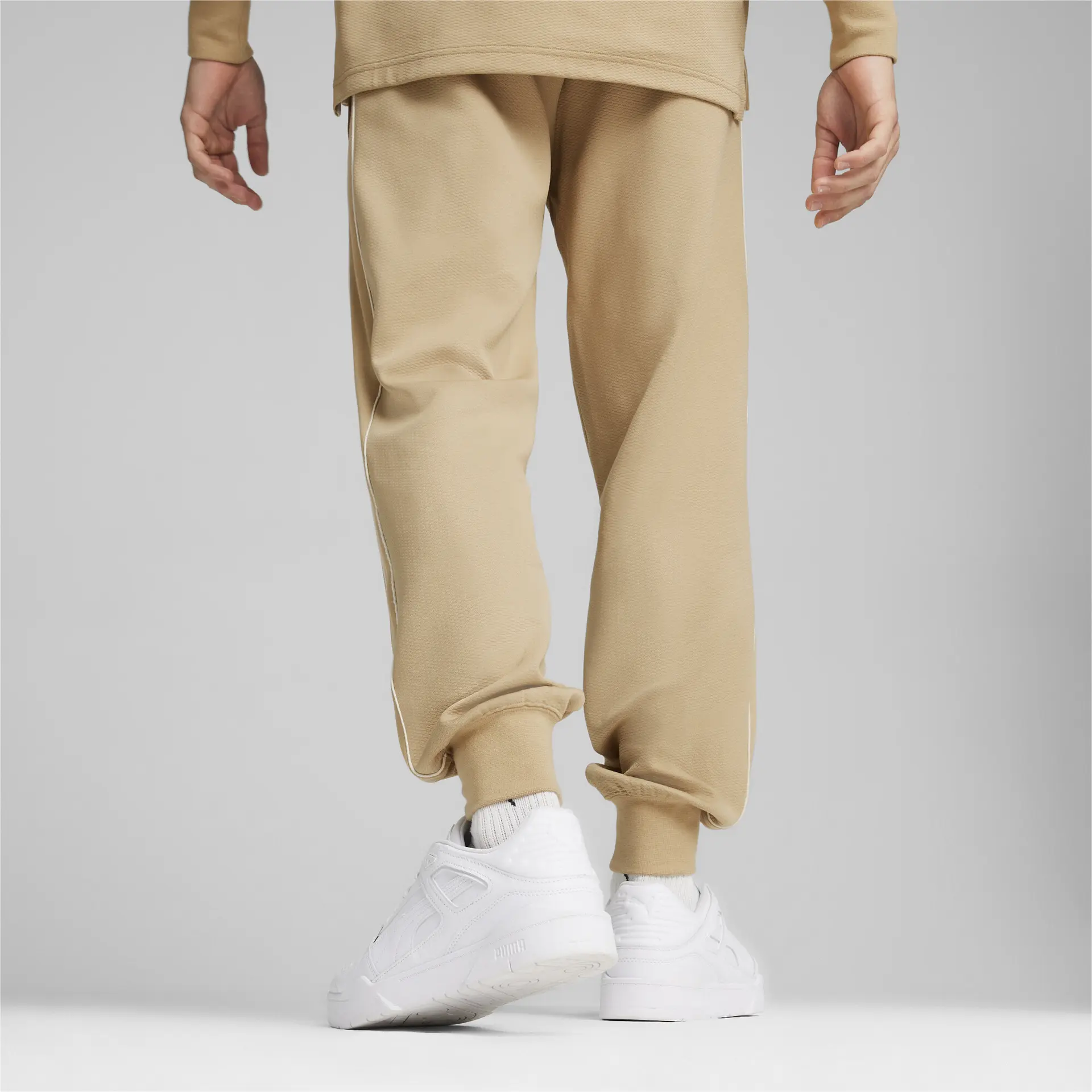 https://storage.alifshop.tj/media/images/alifshop/33393/muzhskie-sportivnye-shtany-puma-t7-track-pants-dk-s-bezhevyy-1742277606311.png