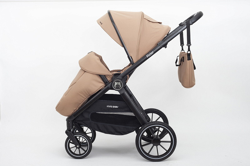 https://storage.alifshop.tj/media/images/alifshop/33494/detskaya-kolyaska-2-v-1-ining-baby-kr345-rider-bezhevyy-1742285787593.png