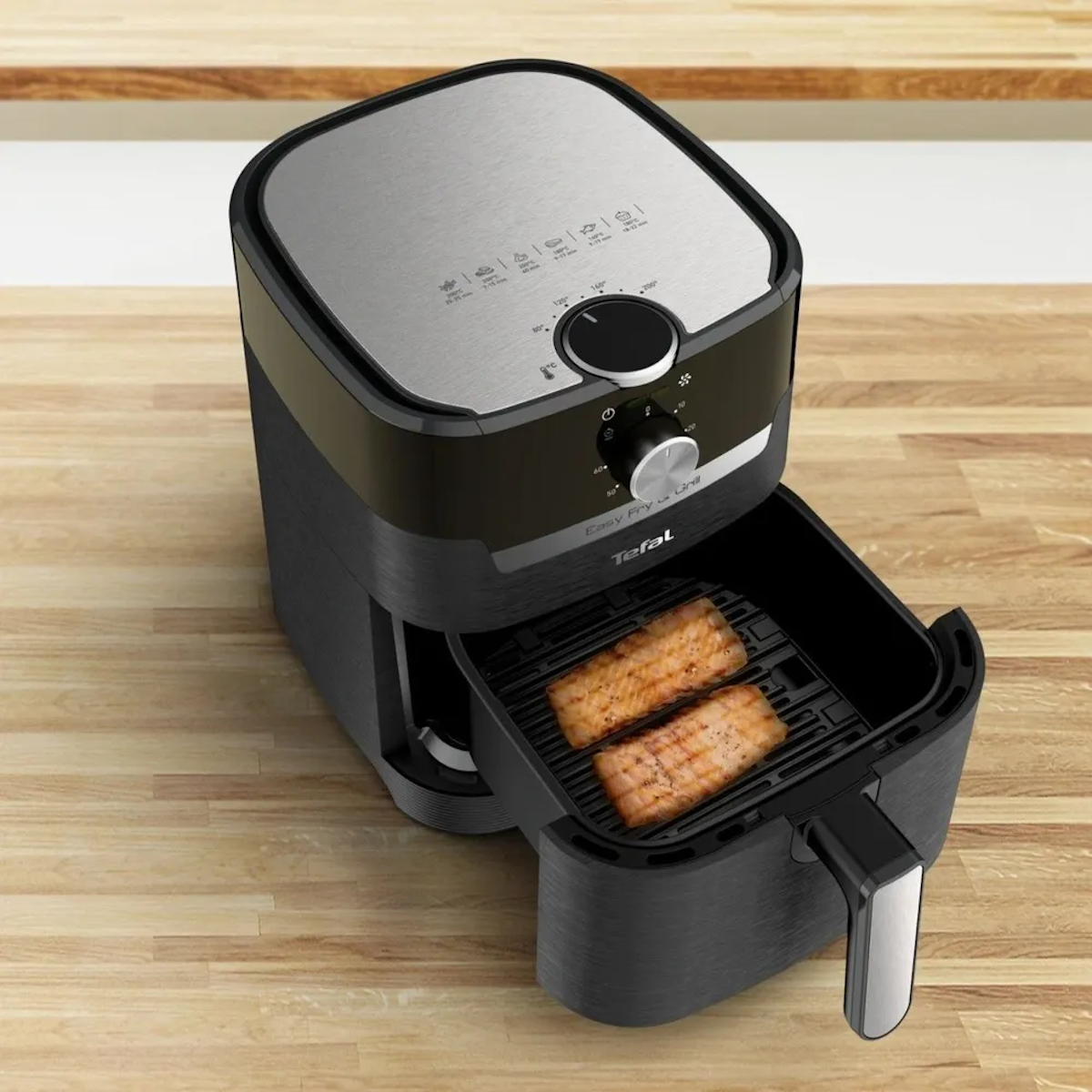 https://storage.alifshop.tj/media/images/alifshop/36519/aerofrityurnica-i-aerogril-2-v-1-tefal-ey501815-chernyy-1748248736259.png
