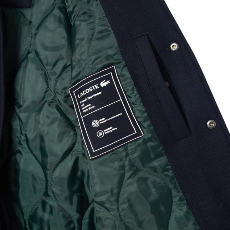 https://storage.alifshop.tj/media/images/alifshop/47482/kurtka-lacoste-premium-wool-varsity-badge-jacket-bh0022-l-temno-siniy-1768156580529.png