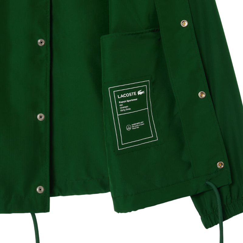 https://storage.alifshop.tj/media/images/alifshop/47486/kurtka-lacoste-lightweight-showerproof-ripstop-coach-jacket-bh0123-xs-zelenyy-1768157231349.png