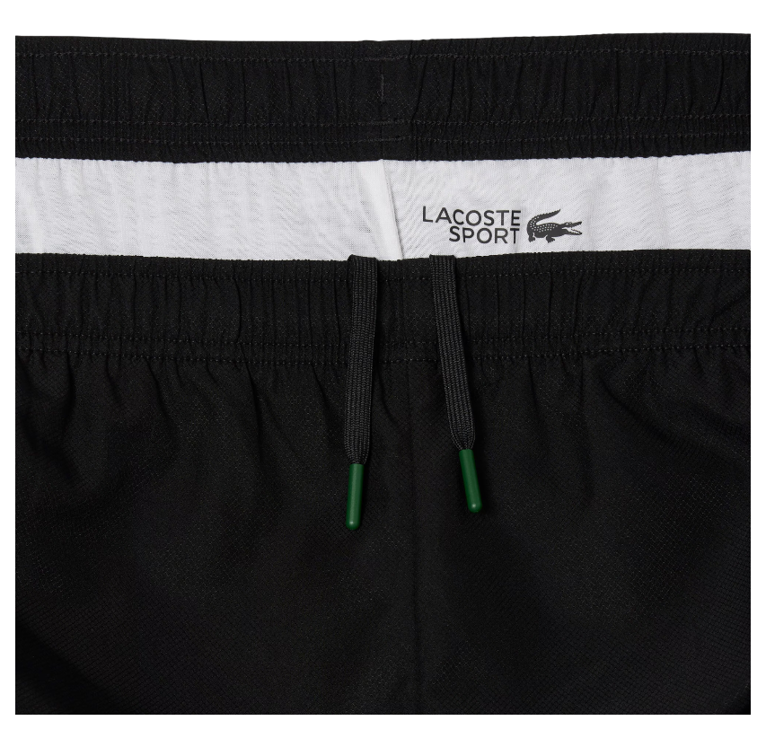 https://storage.alifshop.tj/media/images/alifshop/48049/sportivnyy-kostyum-lacoste-wh8987-s-chernyy-1768501738508.png