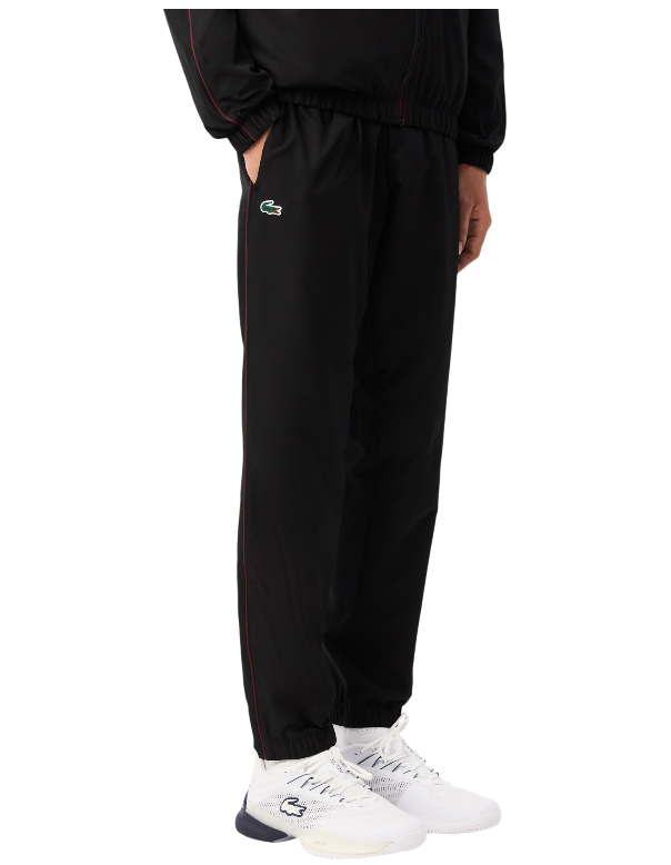 https://storage.alifshop.tj/media/images/alifshop/48103/sportivnyy-kostyum-lacoste-wh2574-s-chernyy-1768553713842.png