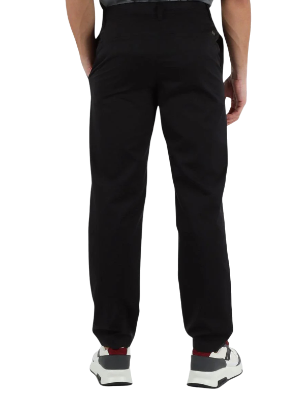 https://storage.alifshop.tj/media/images/alifshop/49329/muzhskie-bryuki-armani-exchange-xm000630-af11882-l-chernyy-1769660388060.png