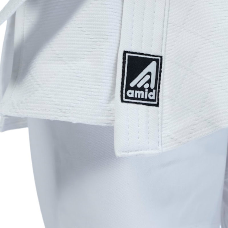 https://storage.alifshop.tj/media/images/alifshop/49502/kimono-dlya-dzyudo-amid-standart-150-sm-belyy-1769751698603.png