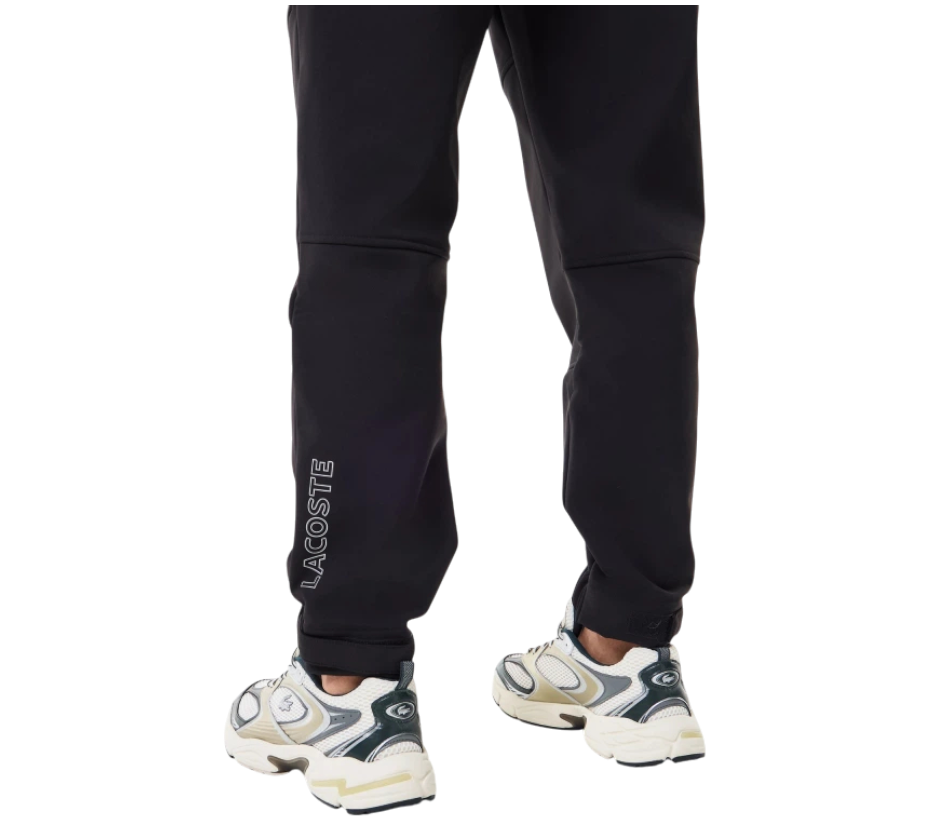 https://storage.alifshop.tj/media/images/alifshop/49664/muzhskie-bryuki-lacoste-hh2521r-xl-chernyy-1769774527025.png
