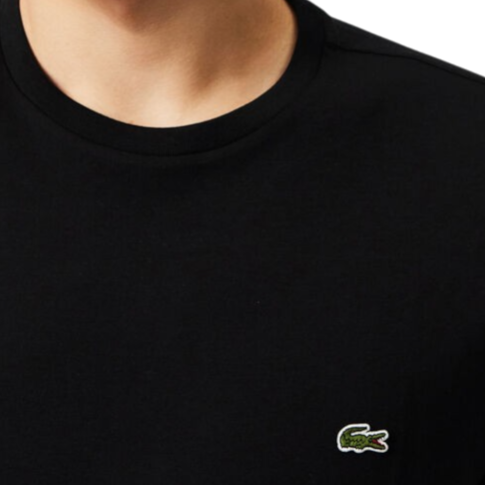 https://storage.alifshop.tj/media/images/alifshop/52504/muzhskaya-futbolka-lacoste-th6709-031-xl-chernyy-1772017640432.png