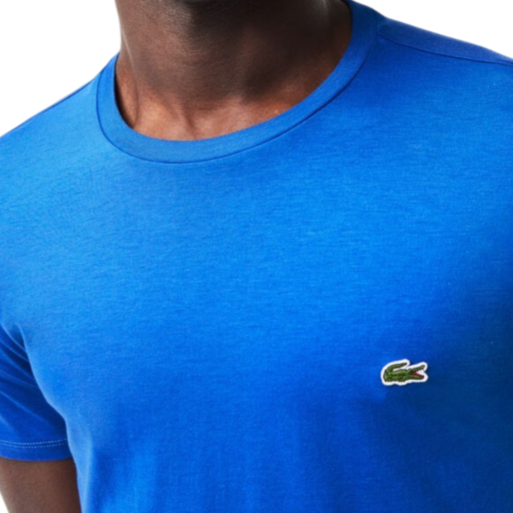 https://storage.alifshop.tj/media/images/alifshop/52532/muzhskaya-futbolka-lacoste-th6709-ixw-xl-siniy-1772018211844.png