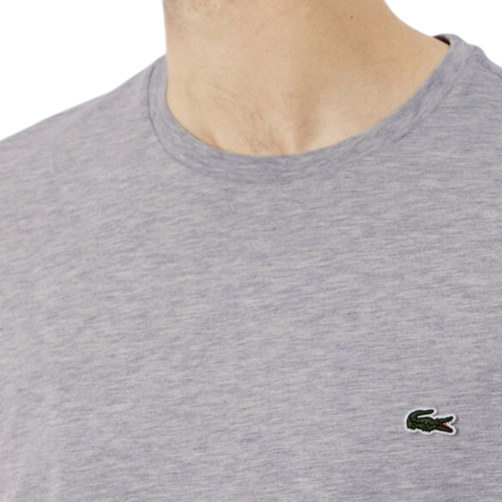 https://storage.alifshop.tj/media/images/alifshop/52545/muzhskaya-futbolka-lacoste-th6709-cca-m-seryy-1772018743316.png