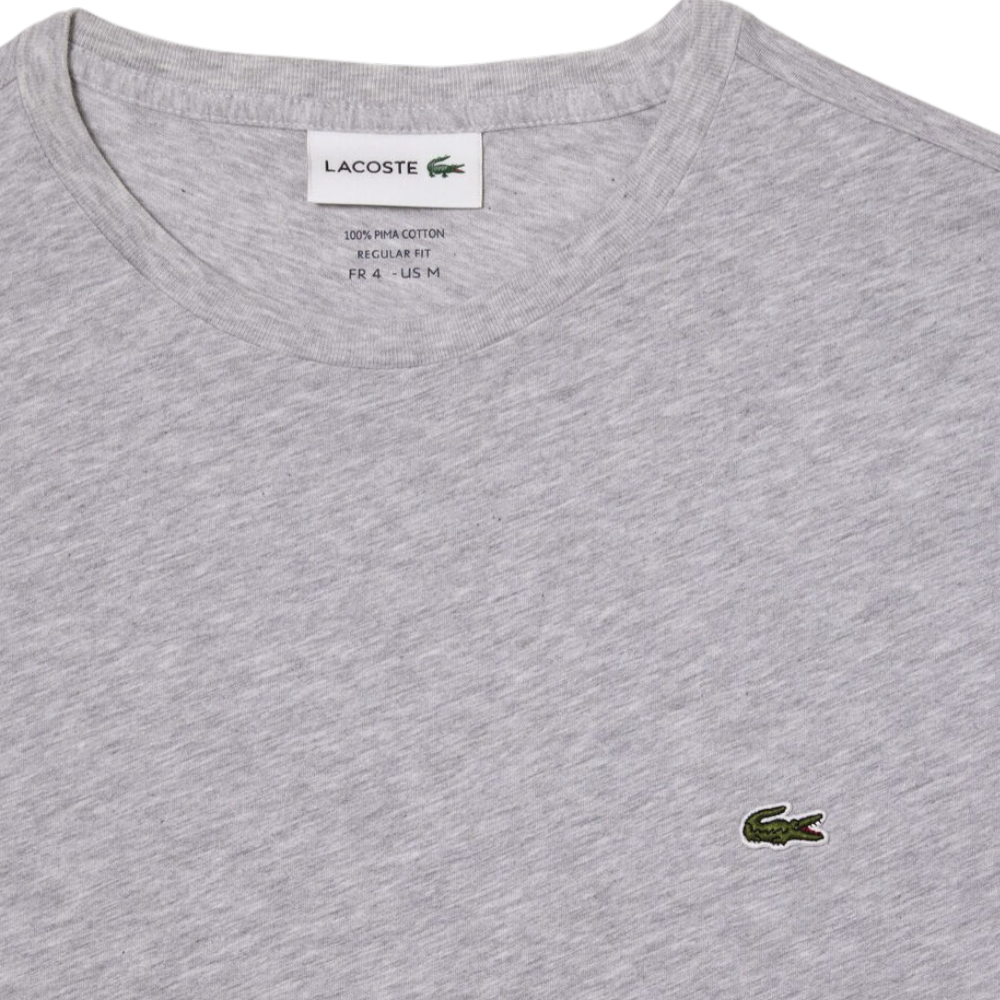 https://storage.alifshop.tj/media/images/alifshop/52549/muzhskaya-futbolka-lacoste-th6709-cca-xl-seryy-1772018811289.png
