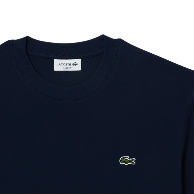 https://storage.alifshop.tj/media/images/alifshop/54483/muzhskaya-futbolka-lacoste-classic-fit-embroidered-crocodile-th7318-166-xs-temno-siniy-1774518608639.png