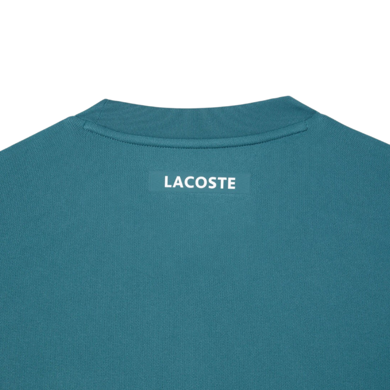 https://storage.alifshop.tj/media/images/alifshop/54491/muzhskaya-futbolka-lacoste-ultra-dry-pique-tennis-th7545-iy4-xxl-siniy-1774519859852.png