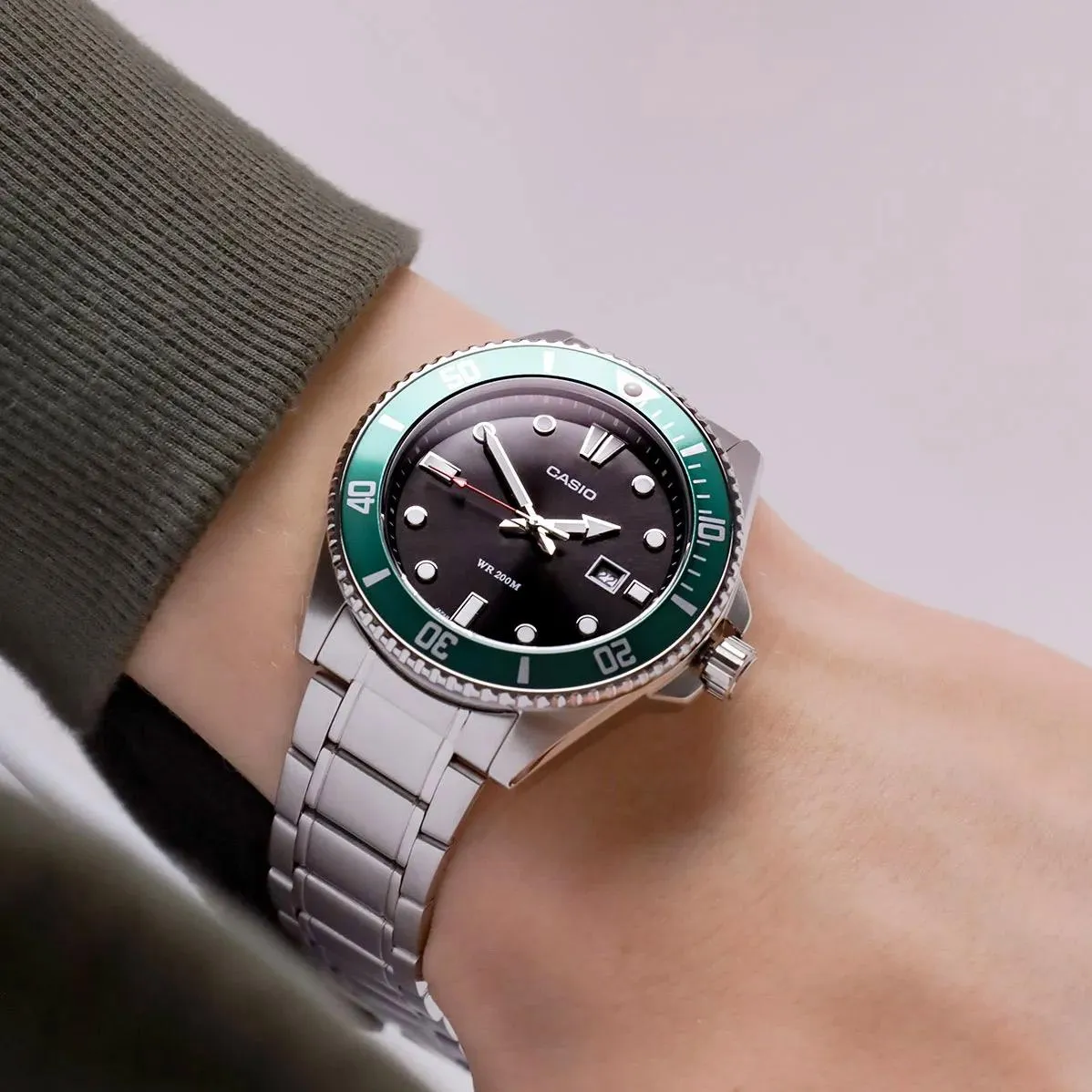 https://storage.alifshop.tj/media/images/alifshop/55219/naruchnye-chasy-casio-mdv-107d-3avdf-serebristo-cherno-zelenyy-1775131362756.png