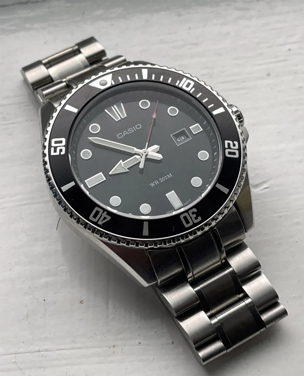 https://storage.alifshop.tj/media/images/alifshop/55223/naruchnye-chasy-casio-mdv-107d-1a1vdf-serebristo-chernyy-1775134449668.png