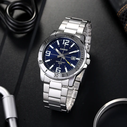 https://storage.alifshop.tj/media/images/alifshop/55243/naruchnye-chasy-casio-mtp-vd01d-2bvudf-serebristo-siniy-1775194645662.png