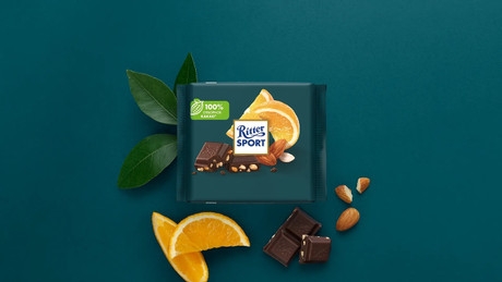 https://storage.alifshop.tj/media/images/alifshop/56208/shokolad-temnyy-ritter-sport-mindal-i-apelsin-100-g-1776690012656.jpg