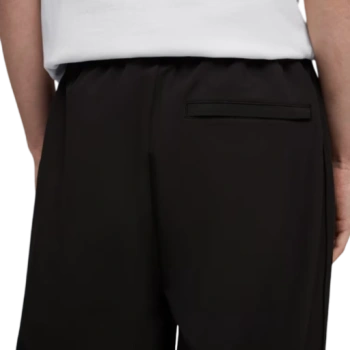 https://storage.alifshop.tj/media/images/alifshop/59158/muzhskie-bryuki-puma-t7-relaxed-woven-track-pants-men-636447-51-l-chernyy-1781698727219-lg.webp