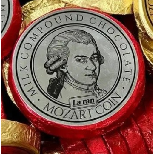 https://storage.alifshop.tj/media/images/alifshop/63016/konfety-la-ran-dark-milk-compound-chocolate-mozart-vesovye-1000-g-1785313273470-BDlo9gFl.png
