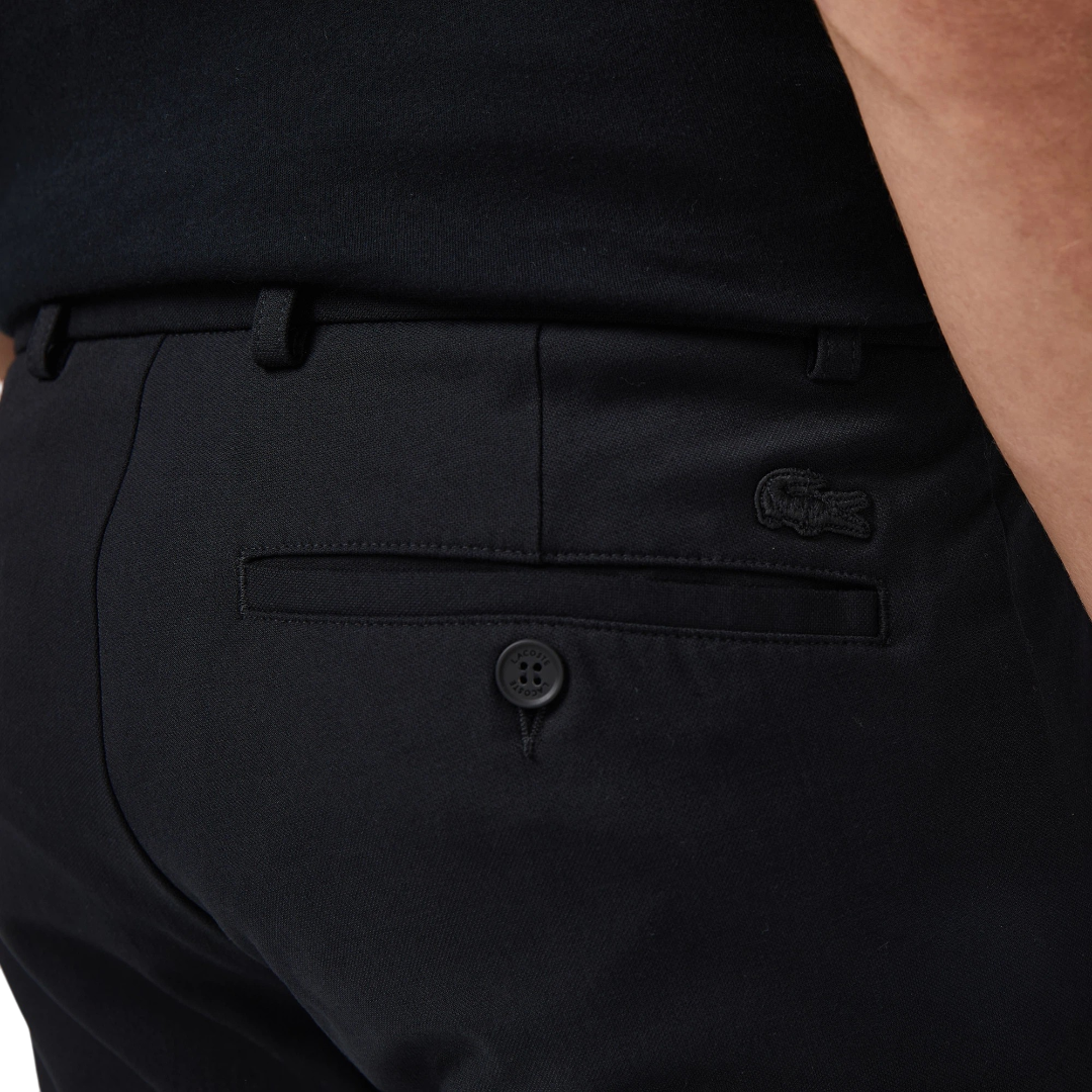 https://storage.alifshop.tj/media/images/alifshop/67557/muzhskie-bryuki-lacoste-hh2628-031-xl-chernyy-1790335961411-wLTWe2IO.png