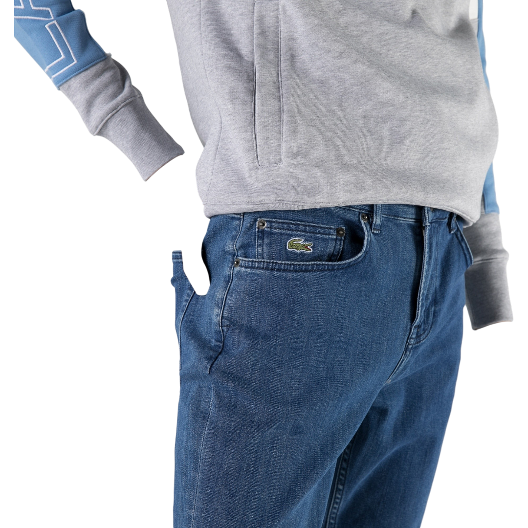 https://storage.alifshop.tj/media/images/alifshop/68426/muzhskie-dzhinsy-lacoste-hh0163-63m-xs-siniy-1790770441437-mHIfvEdo.png