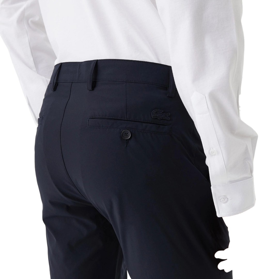 https://storage.alifshop.tj/media/images/alifshop/68647/muzhskie-bryuki-lacoste-hh0334-34l-m-temno-siniy-1790792046839-vaADnyPr.png