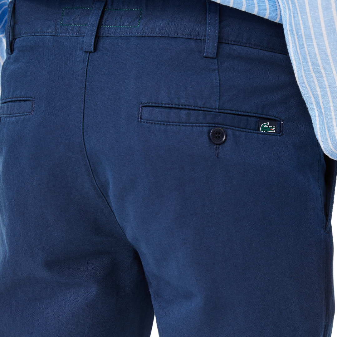 https://storage.alifshop.tj/media/images/alifshop/68954/muzhskie-bryuki-lacoste-hh0980-80l-xl-temno-siniy-1790963861340-sOVpboYL.png