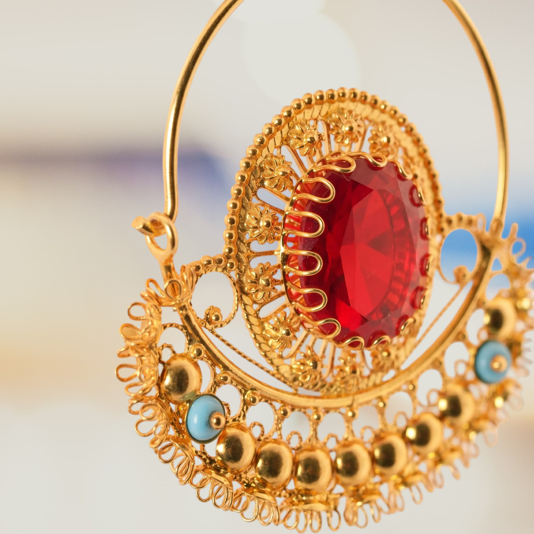 https://storage.alifshop.tj/media/images/alifshop/70947/nacionalnye-sergi-iz-zolota-tojik-crystal-sho-ona-585-proba-12-42-gramm-1793267759935-PIotVGy2.png
