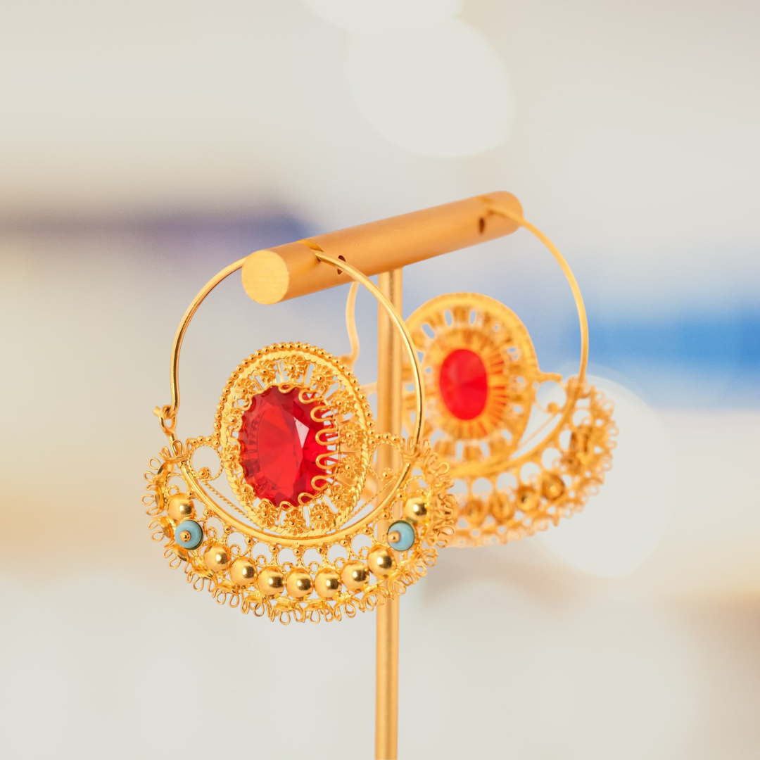 https://storage.alifshop.tj/media/images/alifshop/70947/nacionalnye-sergi-iz-zolota-tojik-crystal-sho-ona-585-proba-12-42-gramm-1793267815252-s9O8xRjB.png